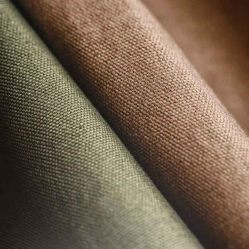 Heavy cotton canvas fabric close-up in brown and army green